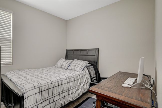 Bedroom featuring carpet | Image 29
