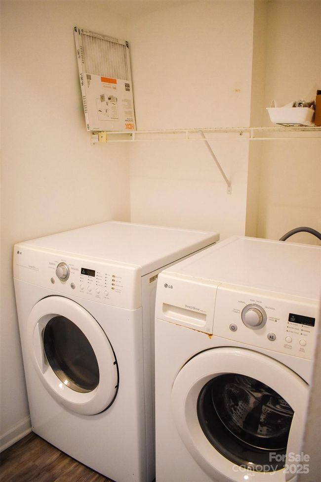 Laundry closet on the main level | Image 42