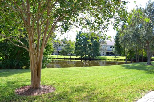 11135 Kapok Grand Cir, MADEIRA BEACH, FL, 33708-3015 | Card Image