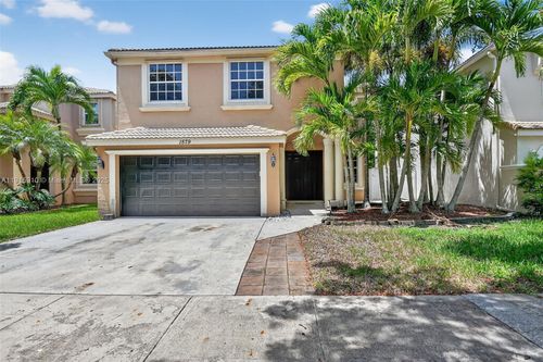 1579 Briar Oak Dr, Royal Palm Beach, FL, 33411-6145 | Card Image