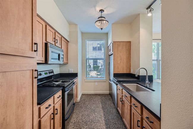 APT-1404 - 1201 Grove Blvd, Condo with 2 bedrooms, 3 bathrooms and 2 parking in Austin TX | Image 9