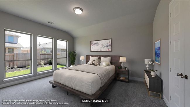 Carpeted bedroom featuring lofted ceiling and baseboards | Image 5