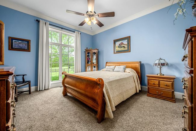 Your guest will love staying in this beautiful bedroom, which offers a perfect blend of comfort and style. | Image 48