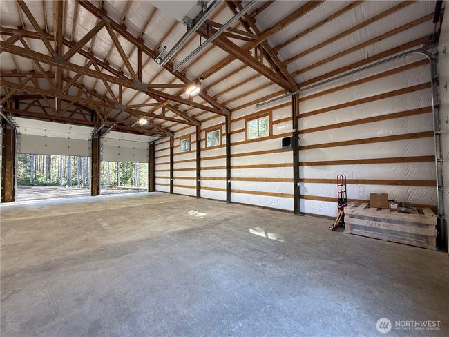 In this picture you can see the attention to every detail this shop has to offer. You can park boats, RV's, trailers, ATV's (there are hundreds of ATV trails nearby), Quads, large vehicles. Not to mention all of the parking outside of this garage. | Image 6