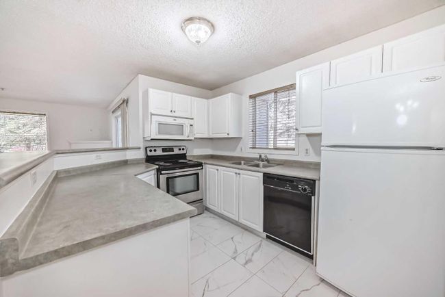107 - 4000 Somervale Court Sw, Home with 2 bedrooms, 2 bathrooms and 1 parking in Calgary AB | Image 4
