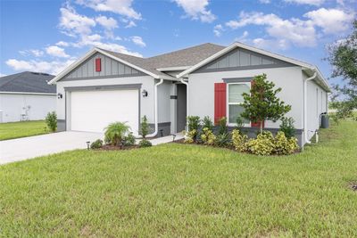 2437 Begonia Street, House other with 4 bedrooms, 2 bathrooms and null parking in Mascotte FL | Image 3