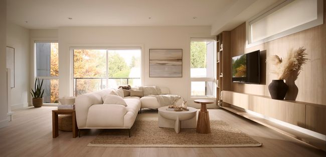 Living room with plenty of natural light and wood finished floors | Image 4