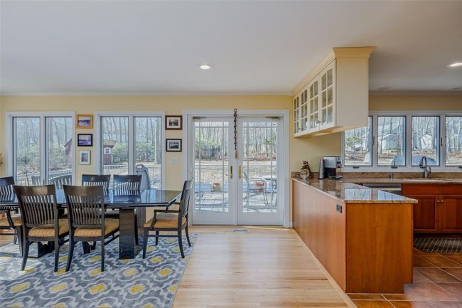 Dining room with crown molding, recessed lighting, and wood finished floors | Image 18