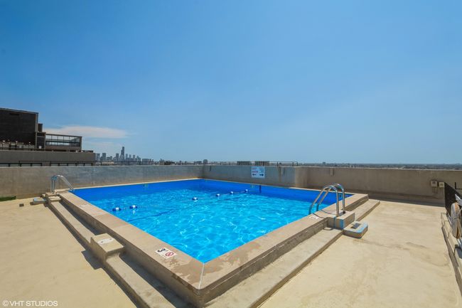 pool and sundeck/city view and lake view | Image 13