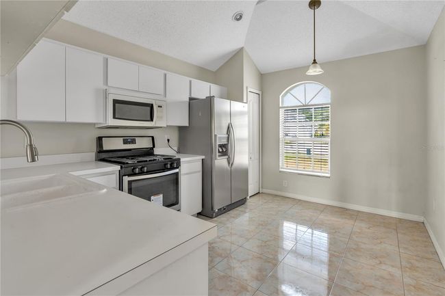 1030 Charmingfare Ct, House other with 3 bedrooms, 3 bathrooms and null parking in WESLEY CHAPEL FL | Image 5