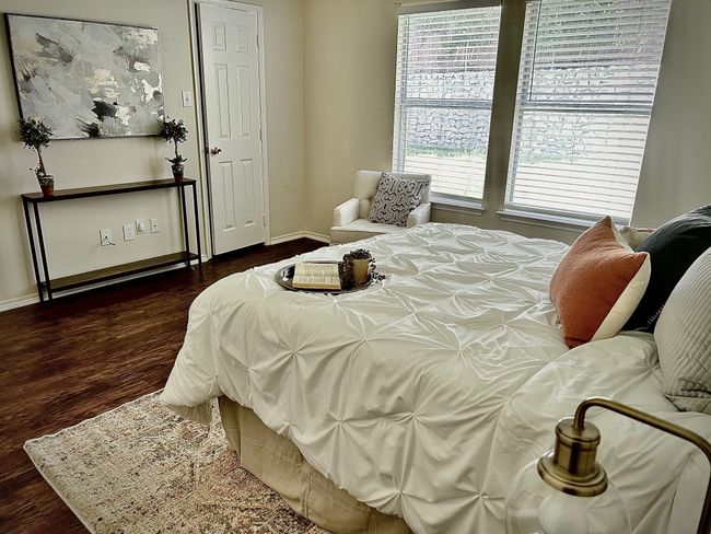 Bedroom featuring dark wood-style floors | Image 15