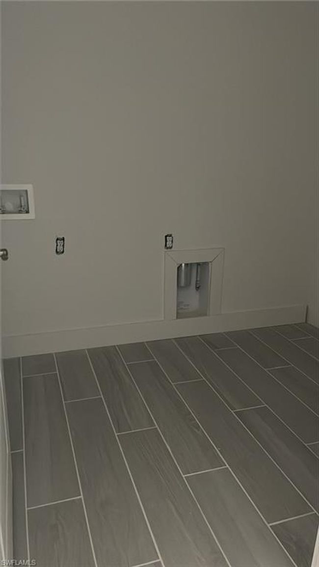 Laundry room with washer and gas dryer hookop | Image 15