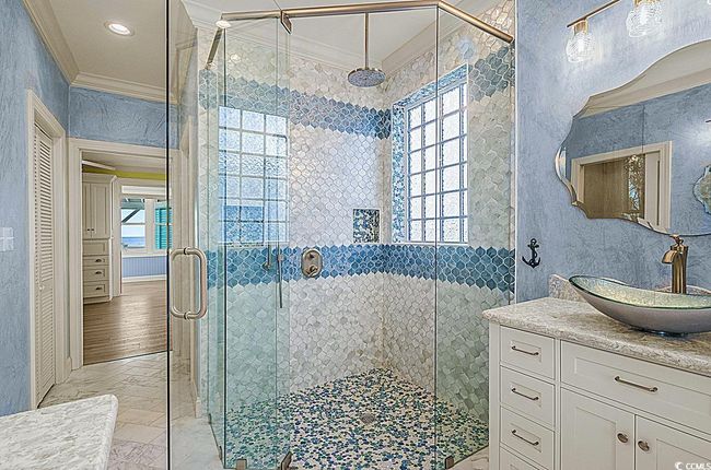 Full bath featuring recessed lighting, crown molding, a shower stall, and vanity | Image 27