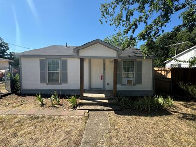 View of front of home with covered porch | Image 1