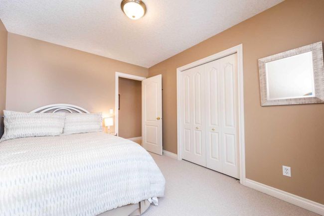 1212 Woodside Way Nw, Home with 4 bedrooms, 2 bathrooms and 4 parking in Airdrie AB | Image 37