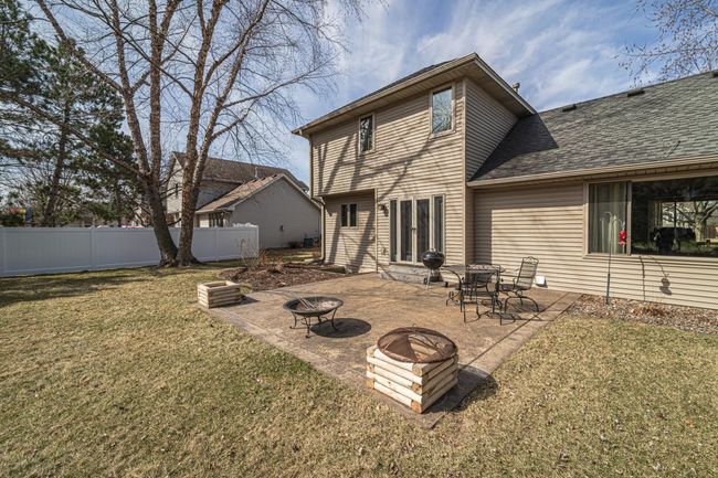 Large stamped concrete patio in back! | Image 40