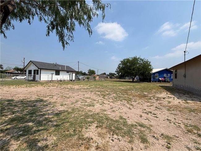 View of yard with fence | Image 11