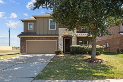 Welcome home to this stunning move in ready 5/3.5/2 home offering 3, 352 sqft with a gorgeous pool! | Image 2