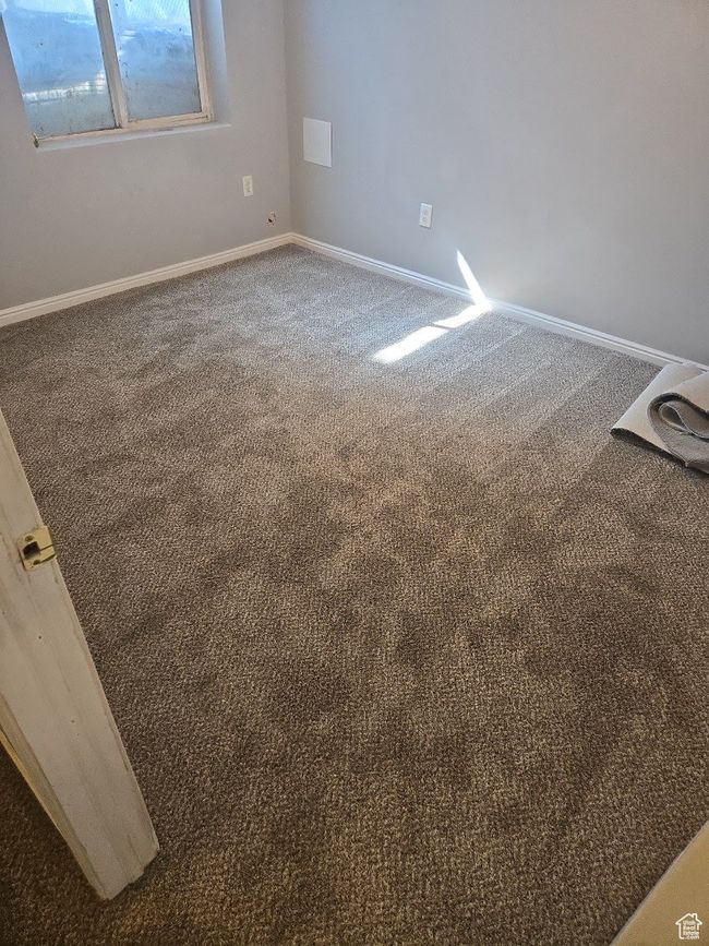 Spare room featuring baseboards and carpet flooring | Image 30