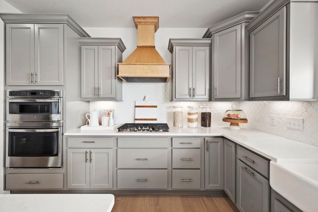 This is our model home and is not for sale. It's an example of what you can build. This high demand neighborhood called "Valley Crest" is one of the most highly sought-after communities in the twin cities. These homes are selling fast. Visit today | Image 4