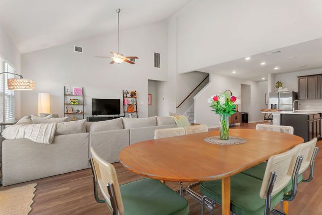 Open living area with vaulted ceiling. | Image 7
