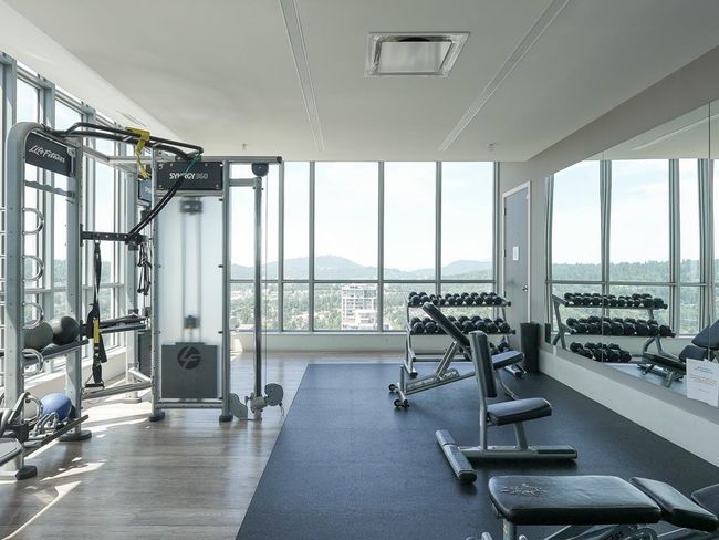 Exercise room featuring a mountain view | Image 16