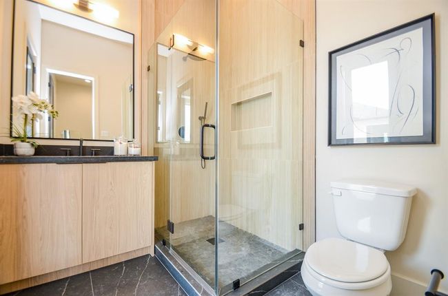 One of 3 full bathrooms downstairs. | Image 10