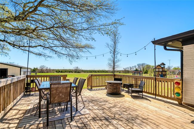 Deck featuring outdoor dining area | Image 4