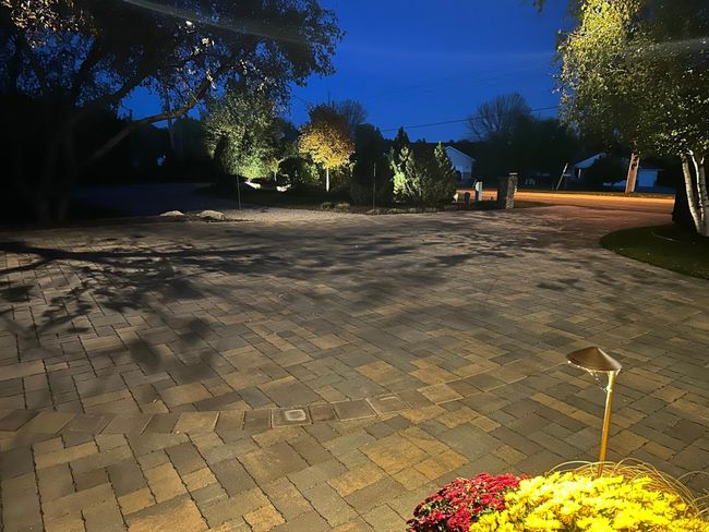 The paver driveway was recently redone. Beautiful landscaping plus a driveway gate. | Image 42