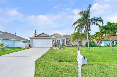 2032 Se South Buttonwood Drive, House other with 3 bedrooms, 2 bathrooms and 2 parking in Port Saint Lucie FL | Image 1