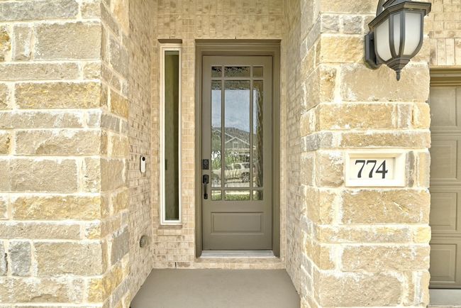 Property entrance featuring stone siding | Image 4