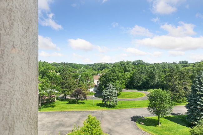 End unit views offer windows on three sides and a balcony | Image 21