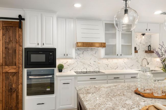 Experience culinary excellence in this stunning custom kitchen, featuring elegant cabinetry, sleek countertops, and modern appliances. Perfect for entertaining and everyday living. | Image 10