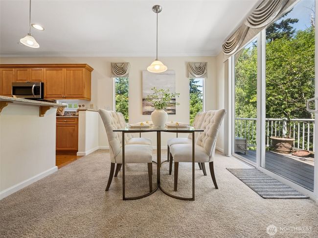Dining area can accommodate 8-10 guests, plus room at the counter if needed! Wonderful entertaining space... | Image 10
