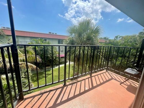 j12-809 W Oakland Park Boulevard, Oakland Park, FL, 33311 | Card Image