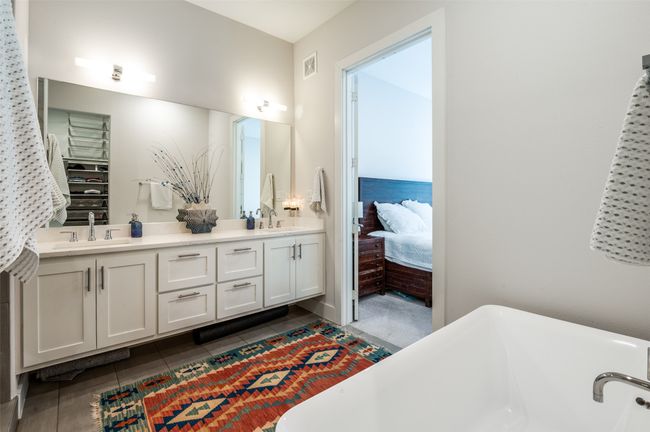 Primary bath with floating cabinets | Image 16