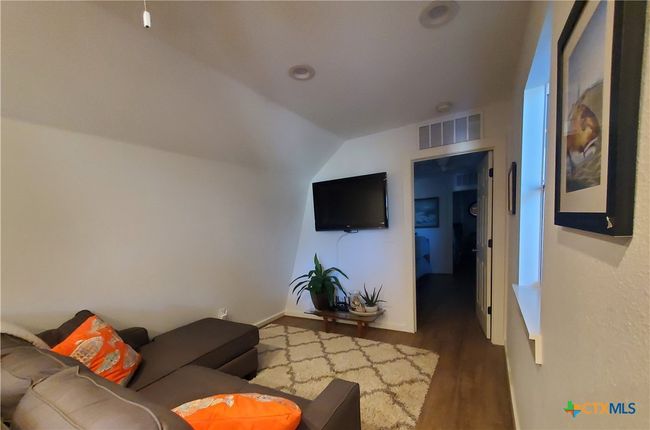 View of living area...with access to bedrooms (2). | Image 12