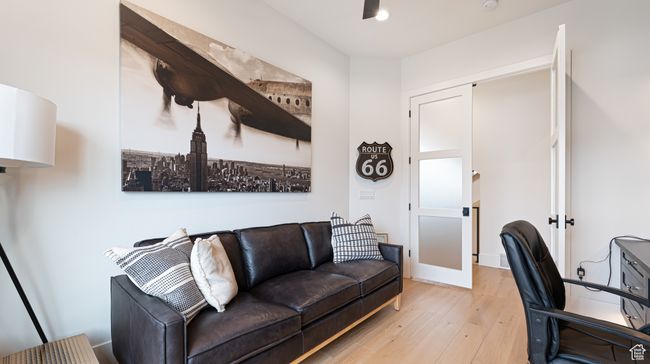 Office space with light wood-style flooring | Image 10