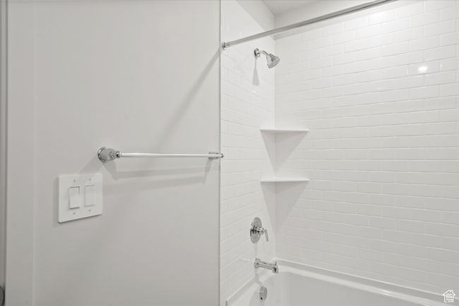 Bathroom with shower / bathtub combination | Image 45