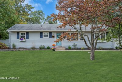 Meticulously maintained ranch in desirable Birchwood Park with beautiful grounds and a pool. | Image 1