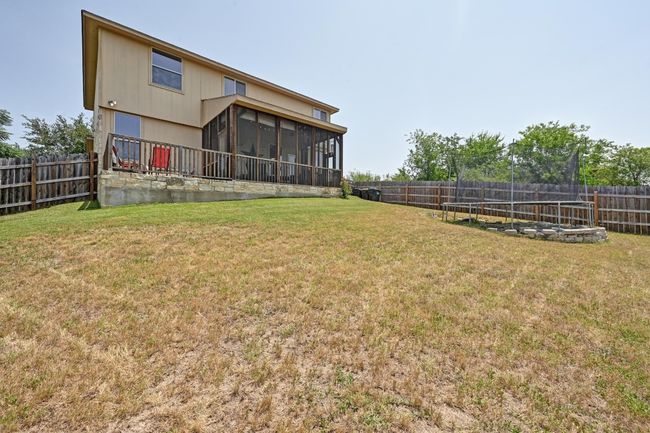 The expansive yard is great for outdoor fun and activities. | Image 24