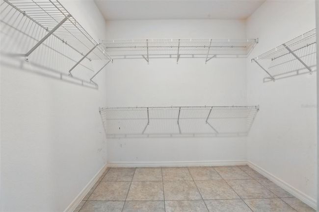 15250 Aquarius Way, House other with 3 bedrooms, 2 bathrooms and null parking in MASCOTTE FL | Image 17
