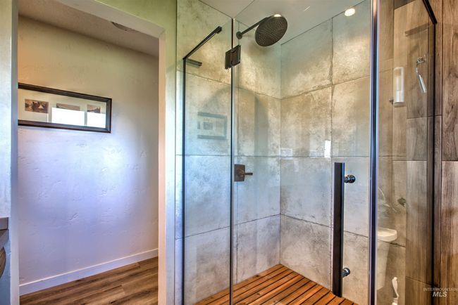 Full bath with wood finished floors and a shower stall | Image 16
