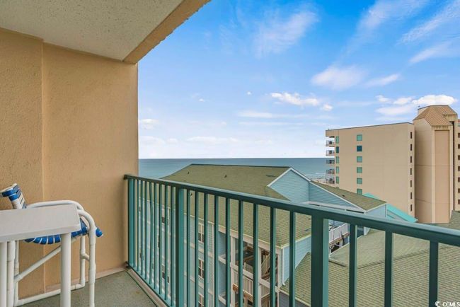 Balcony featuring a water view | Image 27