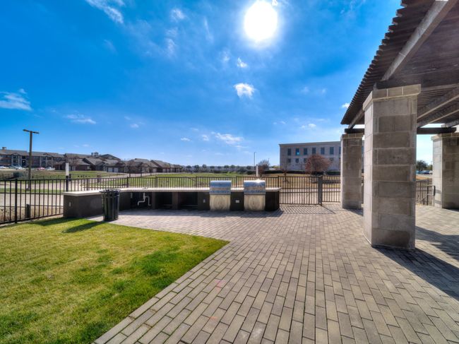 View of patio featuring a residential view and an outdoor kitchen | Image 36