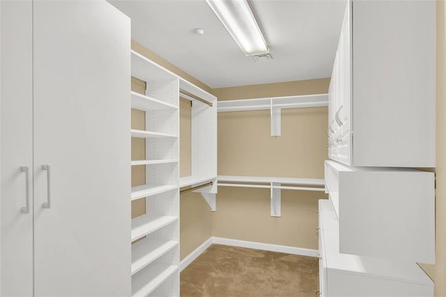 Another glance of the custom closet by California Closets. For additional storage the building offers a climate controlled storage cage for every unit! | Image 24