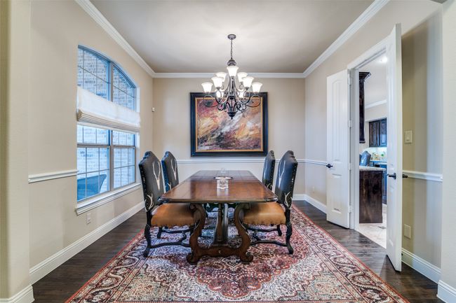 The dining room is conveniently located off of the kitchen for easy access while hosting your events. | Image 6