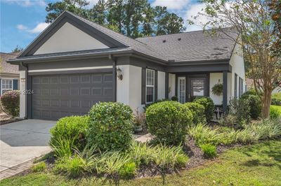 Single story home with a garage | Image 1