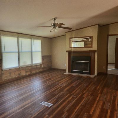 Brand new vinyl floors throughout the kitchen, living & dining areas. | Image 3