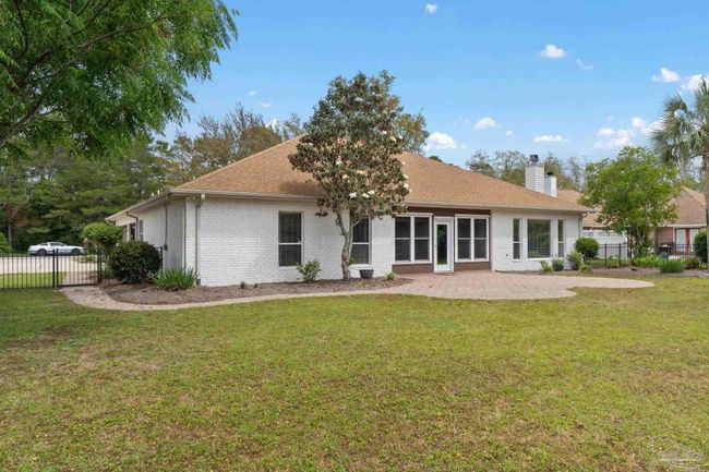 7008 Turnberry Cir, House other with 4 bedrooms, 2 bathrooms and 3 parking in Navarre FL | Image 37